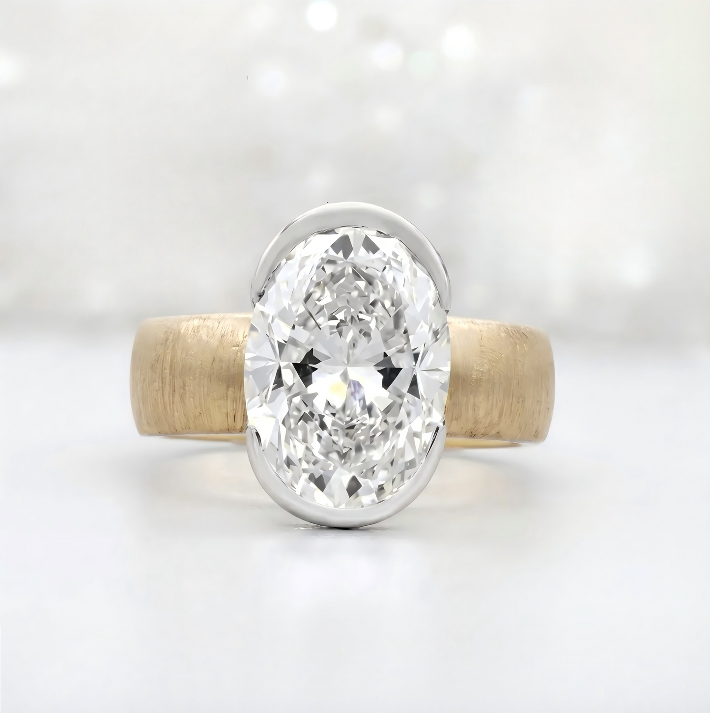 Two-tone gold oval diamond ring